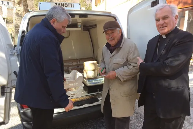 Archbishop Francesco Giovanni Brugnaro and Papal Almoner Archbishop Konrad Krajewski purchase food from small farmers to help support the local economy Photo courtesy of the Holy See Press Office CNA
