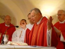 Archbishop Gregory M. Aymond celebrates Mass in the Crypt of St. Peter's Basilica on Jan. 23, 2012