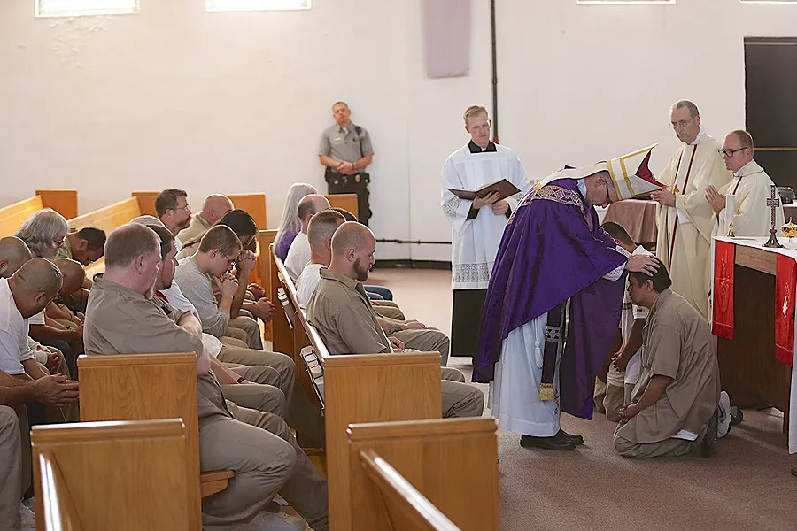 Bishop James Conley of Lincoln gives Confirmation to a prisoner during a Mass said at the Nebraska State Penitentiary, March 31, 2015. Photo courtesy of the Southern Nebraska Register.?w=200&h=150