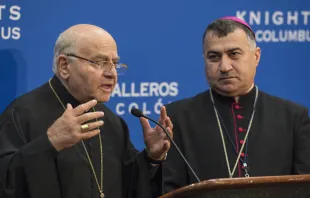 Jean-Clement Jeanbart, Melkite Archbishop of Aleppo, speaks at the KoC Conference in Philadelphia, while Bashar Warda, Chaldean Archbishop of Erbil, looks on, Aug. 4, 2015.   Knights of Columbus