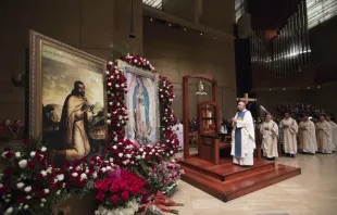 Archbishop Jose Gomez of Los Angeles venerates an image of Our Lady of Guadalupe at the Catheral of Our Lady of the Angels, Dec. 12, 2017. Archdiocese of Los Angeles.