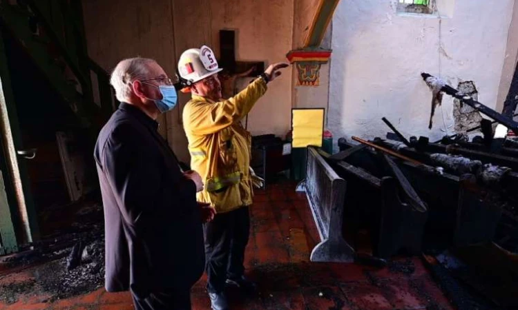 Archbishop Jose Gomez visits the scene of the fire at the San Gabriel mission July 11 2020 Credit  Jon McCoyAngelus News