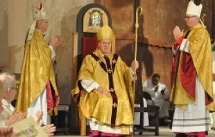 Archbishop Joseph W. Tobin is seated in his cathedra during his installation Mass on Dec. 3, 2012.   The Criterion, Courtesy of the Archdiocese of Indianapolis.