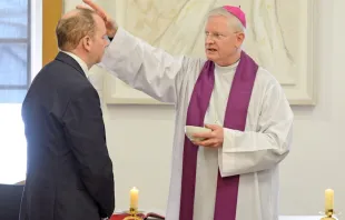 Archbishop Leo Cushley distributes ashes during an Ash Wednesday service in a Scottish Parliament building. Paul McSherry, copyright. Courtesy of the Archdiocese of St. Andrews and Edinburgh.