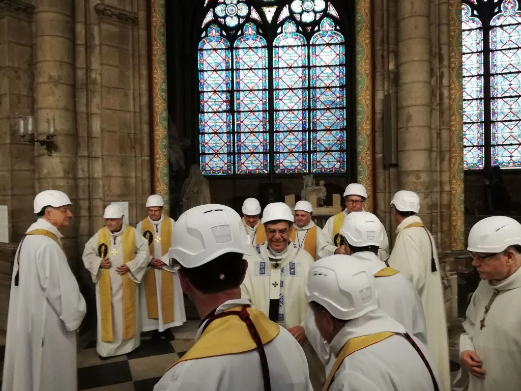 Archbishop Michel Aupetit of Paris greets fellow clerics after the June 15, 2019 Mass in Notre-Dame de Paris' Notre-Dame des Sept Douleurs chapel. ?w=200&h=150