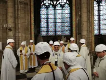 Archbishop Michel Aupetit of Paris greets fellow clerics after the June 15, 2019 Mass in Notre-Dame de Paris' Notre-Dame des Sept Douleurs chapel. 