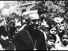 Archbishop Oscaro Romero with young people in El Salvador in this undated file photo. Photo courtesy of Arzobispado de San Salvador/Oficina de la Causa de Canonizacion.