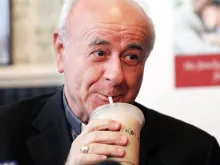 Archbishop Vincenzo Paglia, president of the Pontifical Council for the Family, enjoys a milkshake at Potbelly Sandwich Shop in Philadelphia, March 9, 2015. 