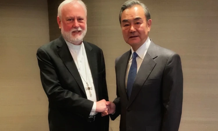 Archbishop Paul Gallagher Secretary for Relations with States of the Holy See meets with Wang Yi Chinas foreign minister in Munich Feb 14 2020 Credit Vatican Media