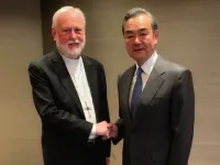 Archbishop Paul Gallagher, Secretary for Relations with States of the Holy See, meets with Wang Yi, China's foreign minister, in Munich, Feb. 14, 2020. 