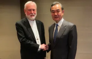 Archbishop Paul Gallagher, Secretary for Relations with States of the Holy See, meets with Wang Yi, China's foreign minister, in Munich, Feb. 14, 2020.   Vatican Media.