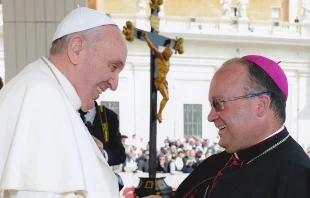 Archbishop Charles Scicluna talks with Pope Francis. Courtesy photo.