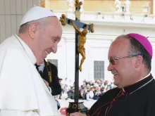 Archbishop Charles Scicluna talks with Pope Francis. Courtesy photo.