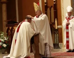 Archbishop Thomas Wenski lays hands on Bishop Gregory Parkes, during the rite of ordination of a bishop. Courtesy photo: Sister Elizabeth Worley.?w=200&h=150