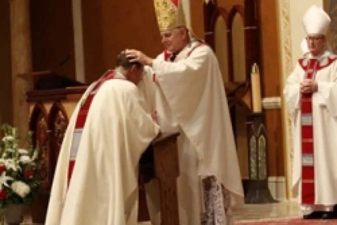 Archbishop Thomas Wenski lays hands on Bishop Gregory Parkes during the rite of ordination of a bishop COURTESY PHOTO   Sister Elizabeth Worley CNA US Catholic News 6 6 12