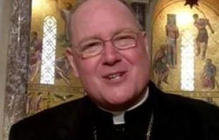 Archbishop Timothy Dolan speaks with CNA after the memorial Mass for Archbishop Pietro Sambi.
