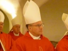 Archbishop Timothy P. Broglio at the tomb of Saint Peter