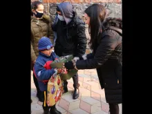 Gia Chacón, organizer of Operation Christmas for Armenia, distributes presents. Photo courtesy of For the Martyrs.