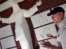 In this 2007 file photo, Bert Baker, an amateur artist, had recently finished a 7-foot-tall sculpture of Christ at Red Bank Baptist Church. 