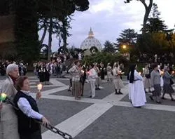 Participants waiting for Pope Benedict XVI at the Vatican's Lourdes Grotto in 2010.?w=200&h=150