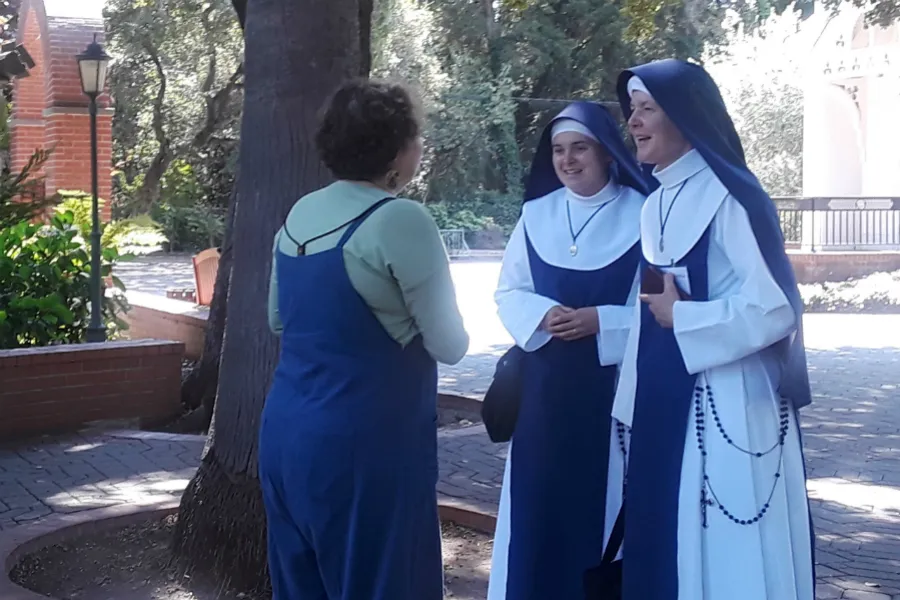 Mary Ann Carr-Wilson greets the Marian Sisters of Santa Rosa before the Teaching Children's Chant Camp Workshop in Menlo Park, Calif., held last week. Photo courtesy of the Benedict XVI Institute.?w=200&h=150