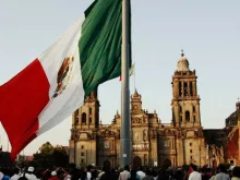 Mexican flag in front of the Mexican cathedral. 