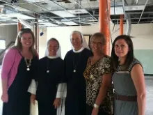 Members of the Sisters for Life visit with the Bella team at the clinic's future location, June 16, 2014. 