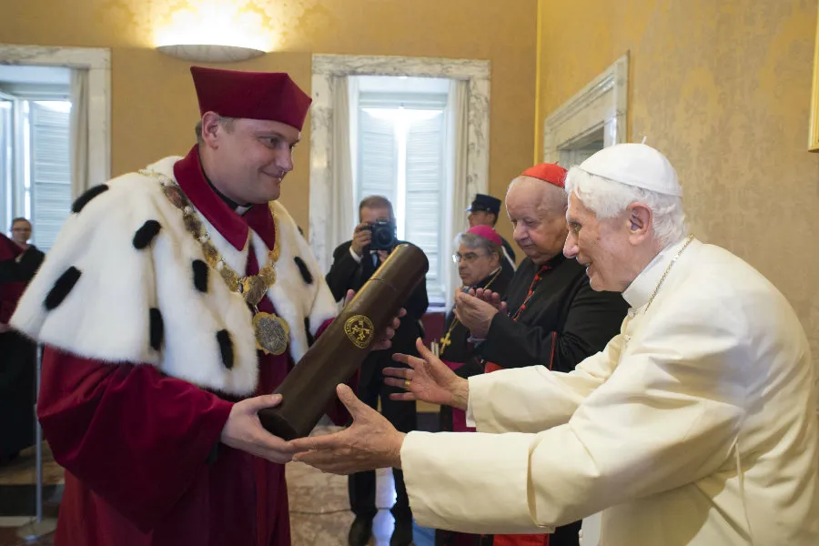 Benedict XVI receives honorary doctorate from the Pontifical University of John Paul II and the Academy of Music in Krakow. Pool photo.