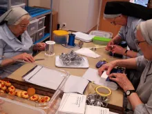 Benedictine nuns of Oviedo preparing cakes. 
