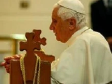 Pope Benedict XVI praying