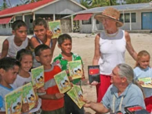 Scott and Jean Adam hand out Bibles as part of their ministry