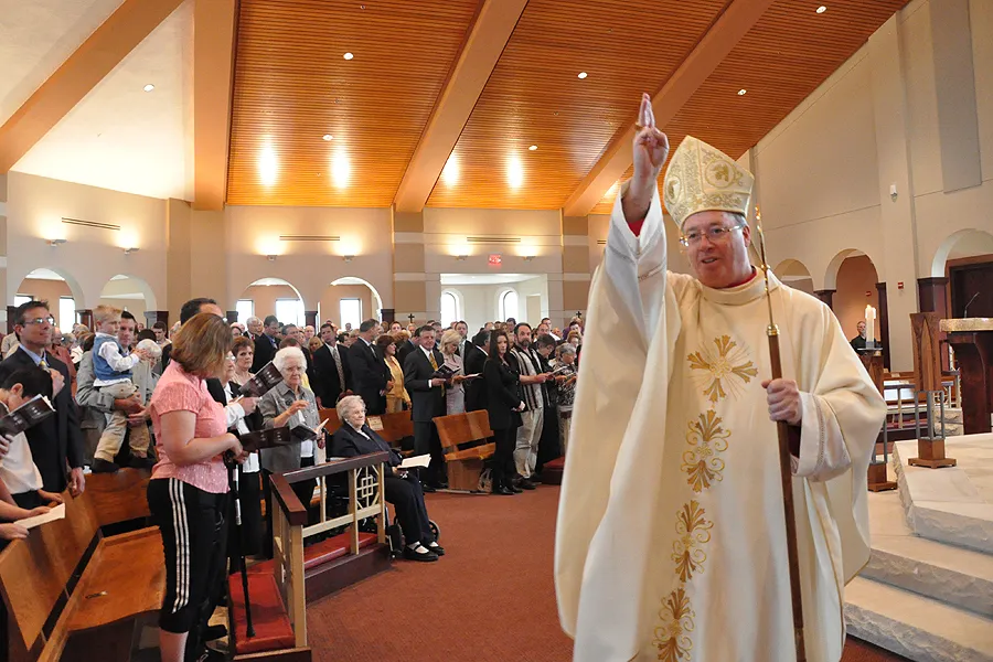 Bishop Christopher J. Coyne gives a blessing March 25, 2012 during the Mass of Dedication at the new St. Mary-of-the-Knobs Church in Floyd County, Ind. (Criterion file photo)?w=200&h=150