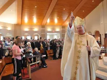Bishop Christopher J. Coyne gives a blessing March 25, 2012 during the Mass of Dedication at the new St. Mary-of-the-Knobs Church in Floyd County, Ind. (Criterion file photo)