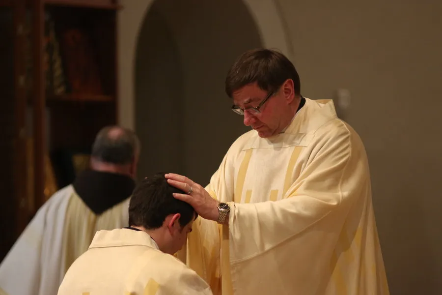 Monsignor James P. Powers, who was appointed Bishop of Superior Dec. 15, blesses a newly ordained priest in June 2014. ?w=200&h=150