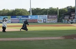 Bishop Gregory J. Hartmayer, OFM Conv., of Savannah throws out the first pitch at Grayson Stadium on June 4, 2014. ?w=200&h=150