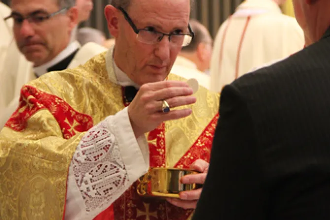 Bishop James D Conley gives communion during his installation as the ninth bishop of Lincoln NE Credit Seth DeMoor CNA CNA US Catholic News 11 20 12