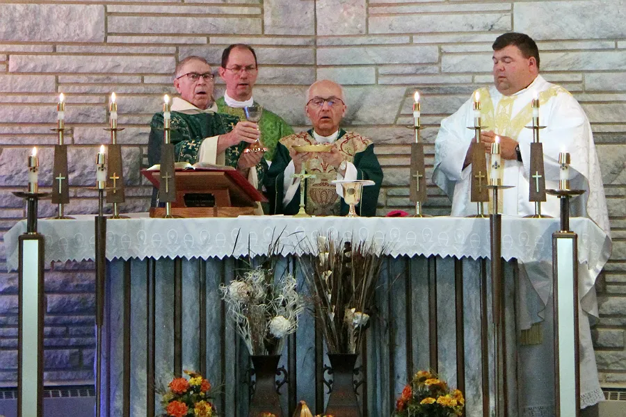 Bishop David Kagan of Bismarck, Bishop John Folda of Fargo, and Fr. Adam Maus say Mass, assisted by Dn. Dennis Dean, at St. John in Lansford, N.D., Aug. 19, 2018. Courtesy of the Bismarck diocese.  ?w=200&h=150