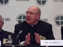 Bishop Kevin J. Farrell of Dallas speaks during a press conference at the 2012 USCCB Fall General Assembly. 