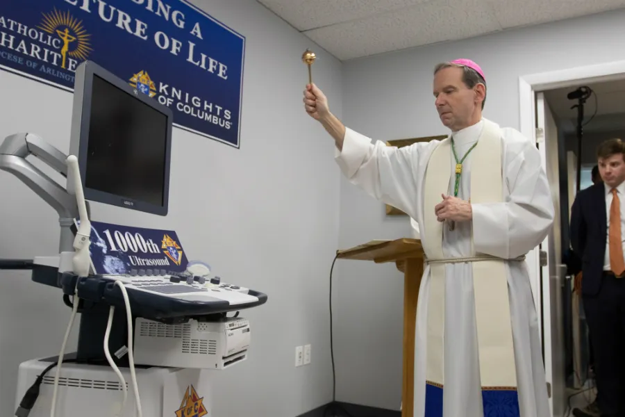 Bishop Michael Burbidge of Arlington blesses the new ultrasound machine for the Mother of Mercy Free Clinic in Manassas, Va., Jan. 14, 2019. Photo courtesy of Joe Cashwell for the Catholic Herald.?w=200&h=150