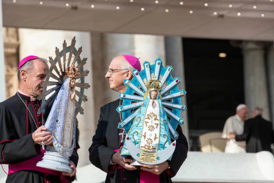Bishop Paul Mason of the UK Armed Forces (L) and Bishop Santiago Olivera of the Argentine Armed Forces hold statues of Our Lady of Lujan in St. Peter's Square, Oct 30, 2019. ?w=200&h=150