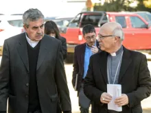 Bishop Santiago Silva of Chile's military diocese (L) and Bishop Fernando Ramos arrive for a bishops' assembly in Punta de Tralca, Chile, Aug. 3, 2018. 