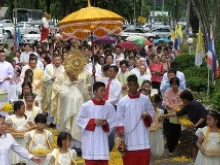 Bishop Silvio Siripong Chartsri of Chantaburi, Thailand leads Eucharistic procession on Corpus Christi, June 2 2013. 