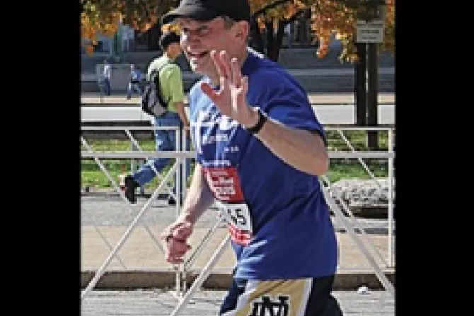 Bishop Thomas J Paprocki waves as he completes the St Louis Rock N Roll Marathon on Oct 21 Photo courtesy of the National LIFE Runners team CNA US Catohlic News 11 8 12