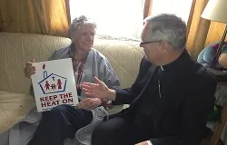 Bishop Thomas J. Tobin of Providence visits with Leo Tremblay in his mobile home in Pawtucket, RI as part of the Keep the Heat on Program. ?w=200&h=150