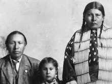 Black Elk, daughter Lucy Black Elk and wife Anna Brings White. Public Domain. 