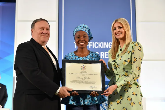 Blessing Okoedion C accepts a Trafficking in Persons Hero award from US Secretary of State Mike Pompeo and presidential advisor Ivanka Trump Credit State Department  Public Domain