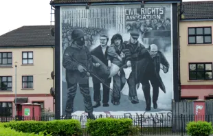 A mural in Derry depicting then-Father Daly leading a group carrying a victim on Bloody Sunday, Jan. 30, 1972. murielle29 via Flickr (CC BY-SA 2.0).