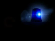 Blue light of a police car. 