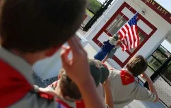 Boy Scouts salute the american flag. ?w=200&h=150