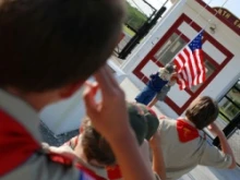 Boy Scouts of America salute the flag during the 2010 National Scout Jamboree on Fort AP Hill, Va. DoD photo by Cherie Cullen.